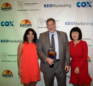 BBBSAZ CEO Laura Capello (left) and BBBSAZ board chair Christine Wilkinson (right) celebrating Quarles’ President’s Award with Phoenix partner Roger Morris. Photo courtesy of Big Brothers Big Sisters of Central Arizona.
