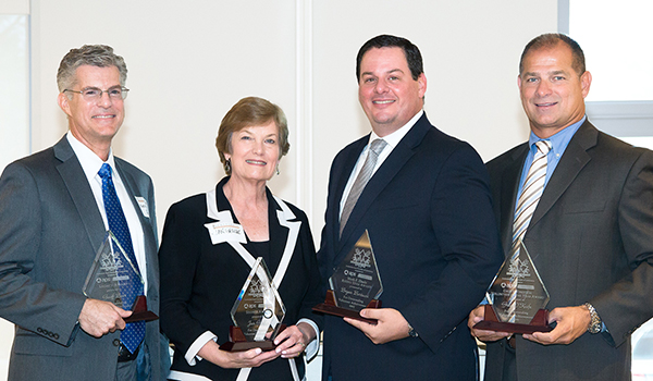 The Scottsdale Area Chamber celebrated its 2015 Business Volunteer Awards on June 10 at Venue 8600 in Scottsdale. The honorees, from left, are: Geoff Beer, Crescent Bay Holdings (Legacy Award); Jan Gehler, Scottsdale Community College (Segner Award); Bryan Bertucci, Raymond James & Associates (Mark F. Eberle Rising Star Award); and Greg O’Keefe, HR Wise LLC (Dale B. Fingersh Volunteer of Year Award). Not pictured: Eric Larson, AVB Development Partners (Chair’s Award). (Photo by Sergio Dabdoub)