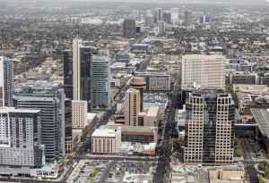 PHOENIX, ARIZONA- MARCH 13, 2014: A low aerial flyover of the downtown business district of Phoenix, Arizona.